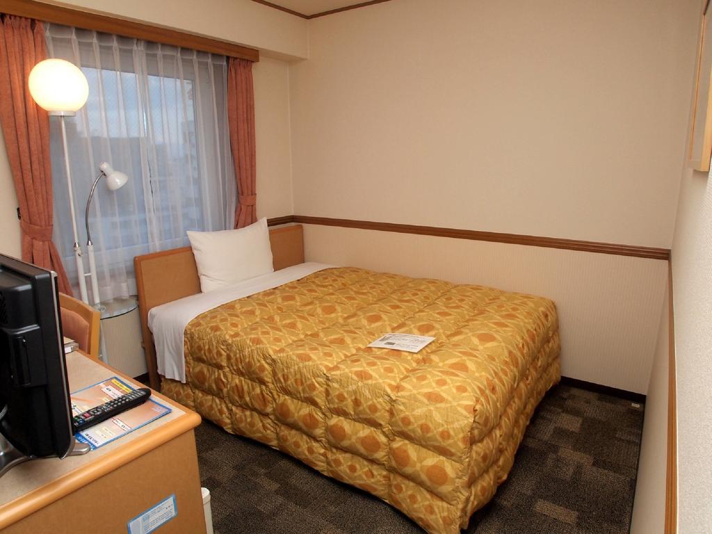 Toyoko Inn Hokkaido Asahikawa Ekimae Ichijo Dori Bagian luar foto